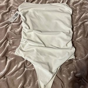 Babaron spaghetti strap bodysuit